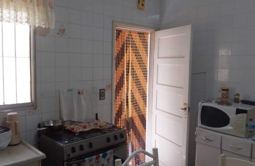Mongagua House | Comfortable house, 300mts from the center, containing shower and barbecue in the yard