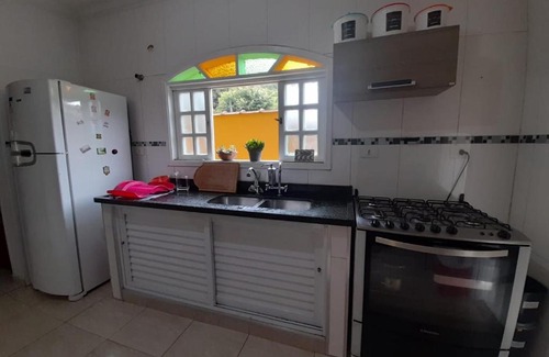 Jardim Primavera House | Sobrado Férias Guarujá