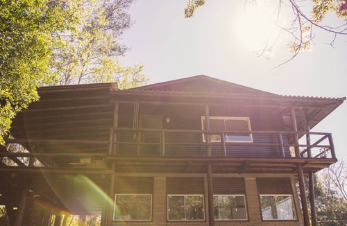 Mampituba House | A property with a cabin and birdsong.