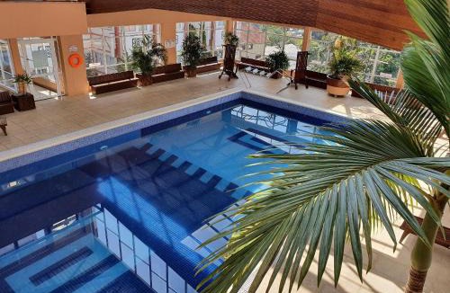 Vila Suica Apartment | Aconchego no Centro de Gramado - 2 dormitórios