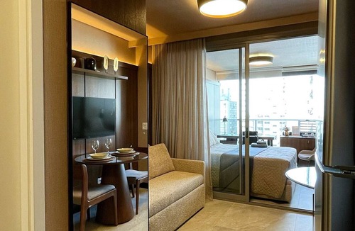 Jardim Paulista Apartment | Air conditioning, pool, bed linens and towels