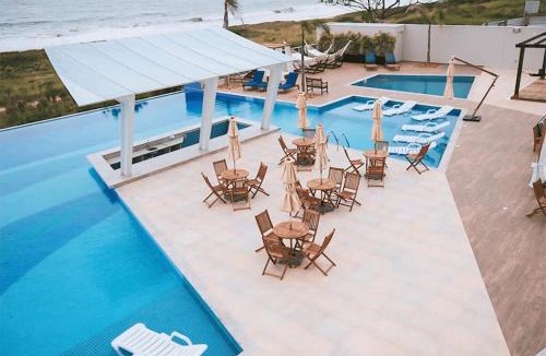 Itacolomi Apartment | Apê Beira Mar com Ar Cond em Condomínio Clube com Piscina, Churrasqueira, Proximo ao Beto Carrero