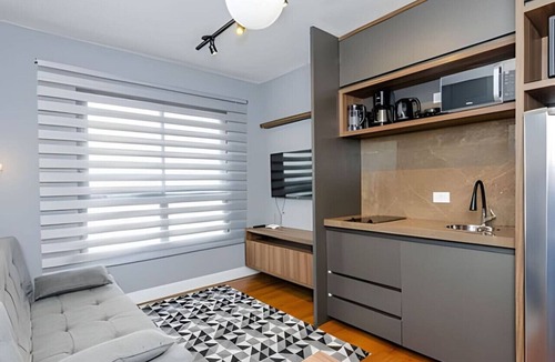 Matriz Apartment | Apartamento completo no Batel — rooftop panorâmico, academia e localização premium