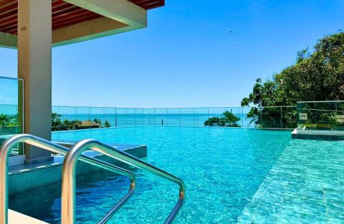 Itacolomi Apartment | Apartamento em Condomínio Frente-Mar com Piscinas, Jacuzzi Aquecida, Sauna, Academia, Brinquedoteca, Churrasqueira na Sacada, Cozinha Completa e Lazer de Home Club