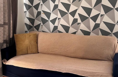 Santa Maria Apartment | Apartment near the airport with a combined balcony, air conditioning, and a hammock.