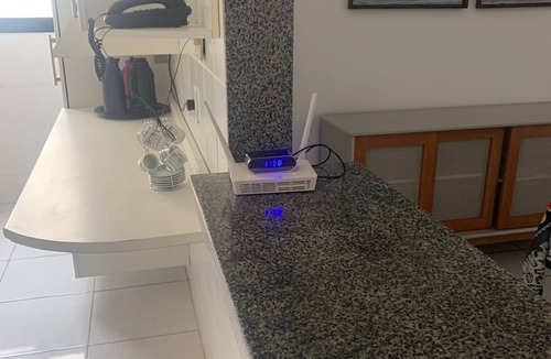 Praia do Morro Apartment | Apartment on Morro Beach in a building facing the sea.