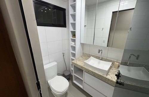 Plano Diretor Sul Apartment | Apartment with AC in living room and bedrooms, with balcony and swimming pool