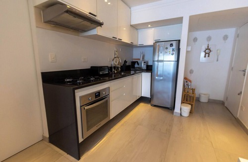 Aparecida Apartment | Apto confortável com linda vista frente para o mar