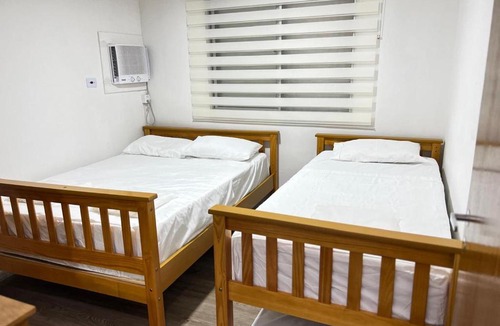 Parque Enseada Apartment | Apto Praia da Enseada 1 Vaga, quartos com Ar