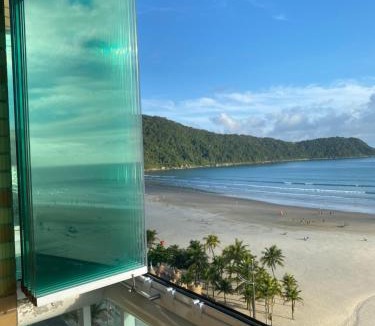 Canto do Forte Apartment | Apto Varanda Gourmet frente ao mar com Wi-Fi
