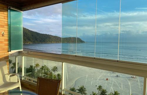 Canto do Forte Apartment | Apto Varanda Gourmet frente ao mar com Wi-Fi