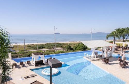 Itacolomi Apartment | Apto Vista Mar Home Club Pé na Areia 3 Quartos Ares Condicionados Cozinha Completa Piscina Aquecida Jacuzzi Sauna Academia Quadra Playground Salão de Jogos 15min do Beto Carrero