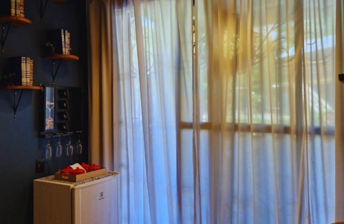 Bairro das Laranjeiras Apartment | Backyard Loft