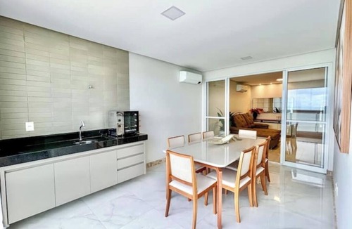 Praia do Morro Apartment | Beachfront apartment in Praia do Morro with air conditioning and barbecue.