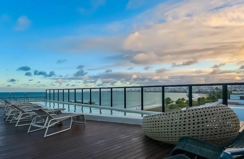 Jardim Oceania Apartment | Beachfront Gourmet Studio with Private Pool