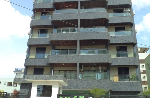 Asturias Apartment | Beautiful apartment. Asturias-Guarujá, with balcony and free Wi-Fi, 150 m from the beach.