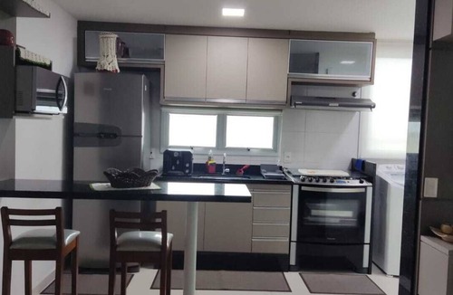 Praia do Morro Apartment | Beautiful apartment with 2 bedrooms (1 suite), garage and mountain views.