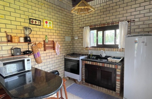 Praia do Rosa House | Beautiful house in Praia do Rosa overlooking the lagoon.