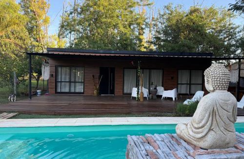 Oliveros House | Brisas del Bosque