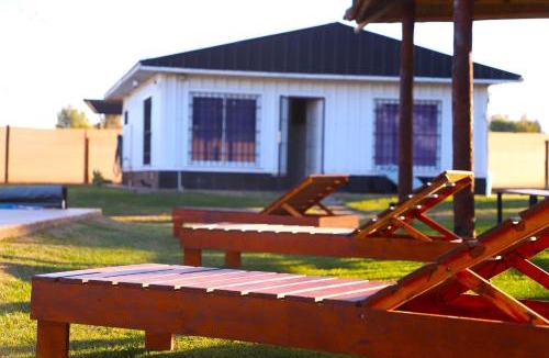 Las Compuertas Ski Chalet | Cabaña con pileta CLIMATIZADA y gran parque en Mendoza AZUL