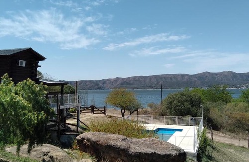 Yocsina House | Cabaña en Villa Carlos Paz Danza del sol