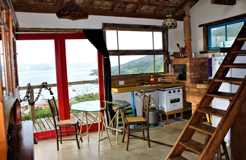 Ilhabela Historical Center Ski Chalet | CantaGalo Ilhabela rustic and cozy from where you can see the sea and the hills of the island.