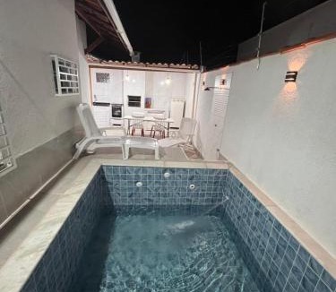 Cibratel II House | Casa Aconchegante em Itanhaem- Piscina e Churrasqueira 10 pessoas