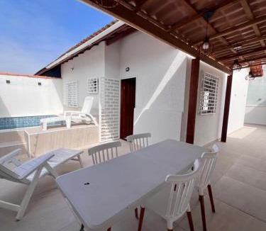 Cibratel II House | Casa Aconchegante em Itanhaem- Piscina e Churrasqueira 10 pessoas