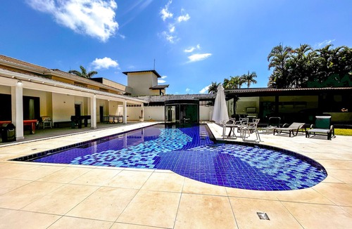 Jardim Acapulco House | Casa Alto Luxo - Lazer Completo - Piscina Climatizada, Sauna, Campo de Futebol