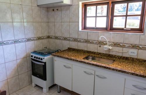 Vila Britania House | Casa com grande quintal em Campos do Jordão