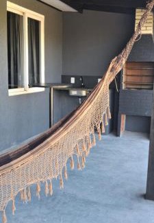 Arroio Teixeira House | Casa com piscina e pátio grande
