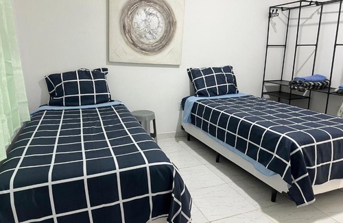 Jardim Primavera House | Casa completa para grupo familiar ou trabalhadores comporta tranquilamente seis hóspedes em 2 quartos e 1 Suite