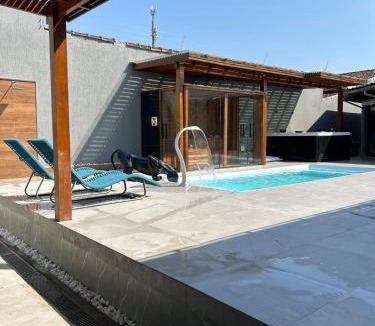 Jardim Britania House | Casa Coral