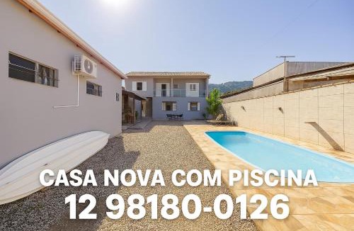 Taquaral House | Casa de 4 suites com piscina, próxima a praias e do centro de Ubatuba