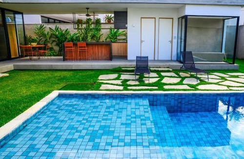 Jardim Acapulco House | Casa de Cinema no Guarujá - Condomínio Acapulco