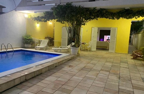 Jardim Centenario House | Casa de férias no Guarujá.