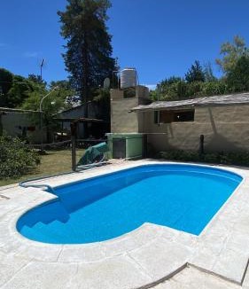 Comuna de San Roque Apartment | Casa en complejo con pileta compartida