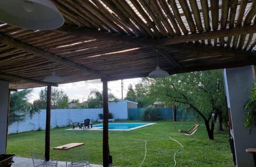 Funes House | Casa en Funes. Pileta, Parrilla & Parque.