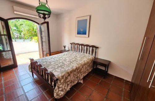 Jardim Virginia House | Casa Enseada 4 suites , 2 quadras do mar local nobre