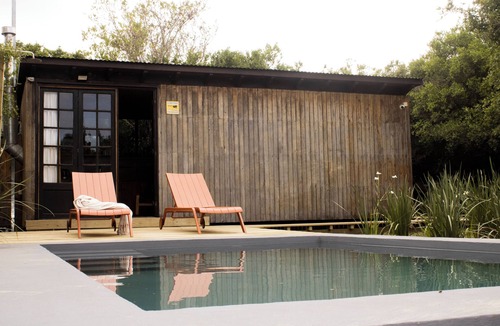 Rocha House | CASA LOBO- La Pedrera A contemporary refuge between the forest and the sea.
