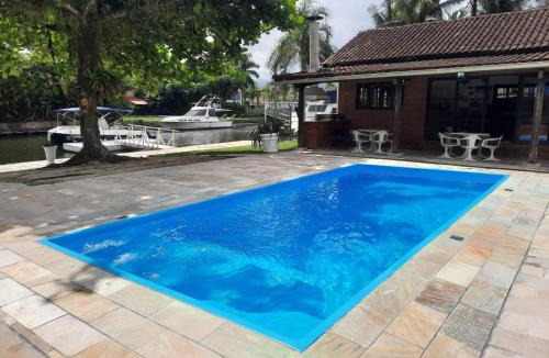 Marina House | Casa na Marina com piscina churrasqueira e píer
