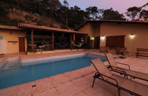 Osasco House | Casa nas montanhas com piscina, lazer completo e vista encantadora