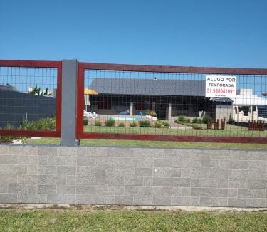 Capao da Canoa House | Casa ,piscina há 100 metros do mar ,24 pessoas