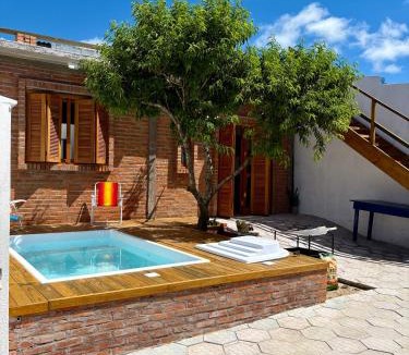 Querencia House | Casa quadra-mar com piscina