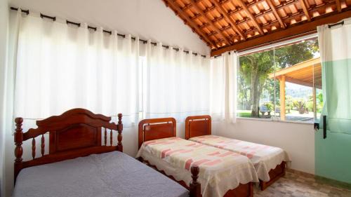Jardim Shangri-La House | Chacara aconchegante em Atibaia com area de lazer!