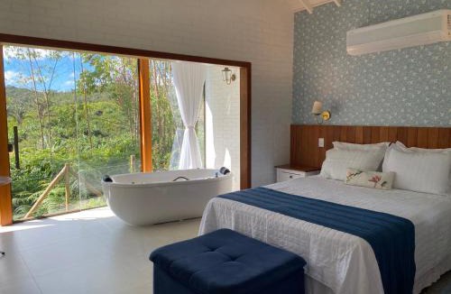 Santa Teresa Ski Chalet | Chalés Colina dos Colibris