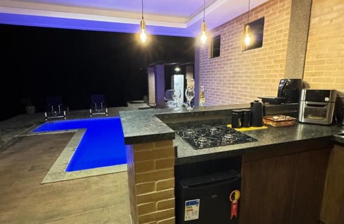 Pirenopolis Ski Chalet | CHALE YPE AMARELO Ypês da Serra Chalés