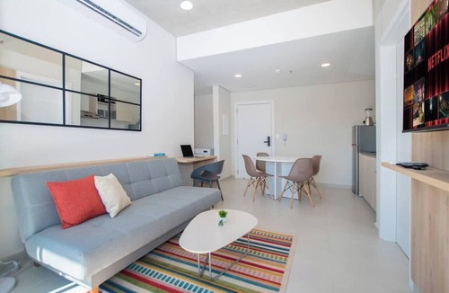 Luque Apartment | Chic Two-Bedroom Near Shopping with Pool and BBQ Lounge