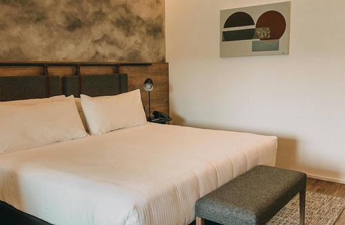 Villa General Belgrano Hotel | Comfort-Driven Room w/Balcony Perfect for Quiet Retreat |Outdoor & Indoor Pools