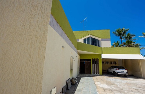 Vilas do Atlantico House | Comfort in front of the Sea, standing in the sand.